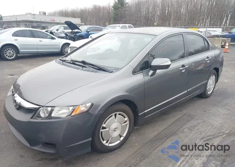 2010 Honda Civic Hybrid from USA, damaged, VIN JHMFA3F20AS007455